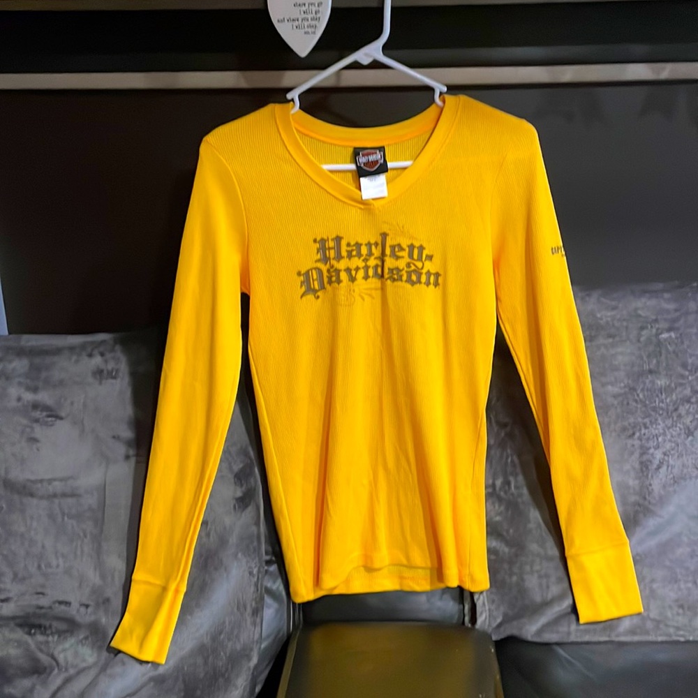 Women’s size medium, Harley Davidson V Neck long sleeve shirt.